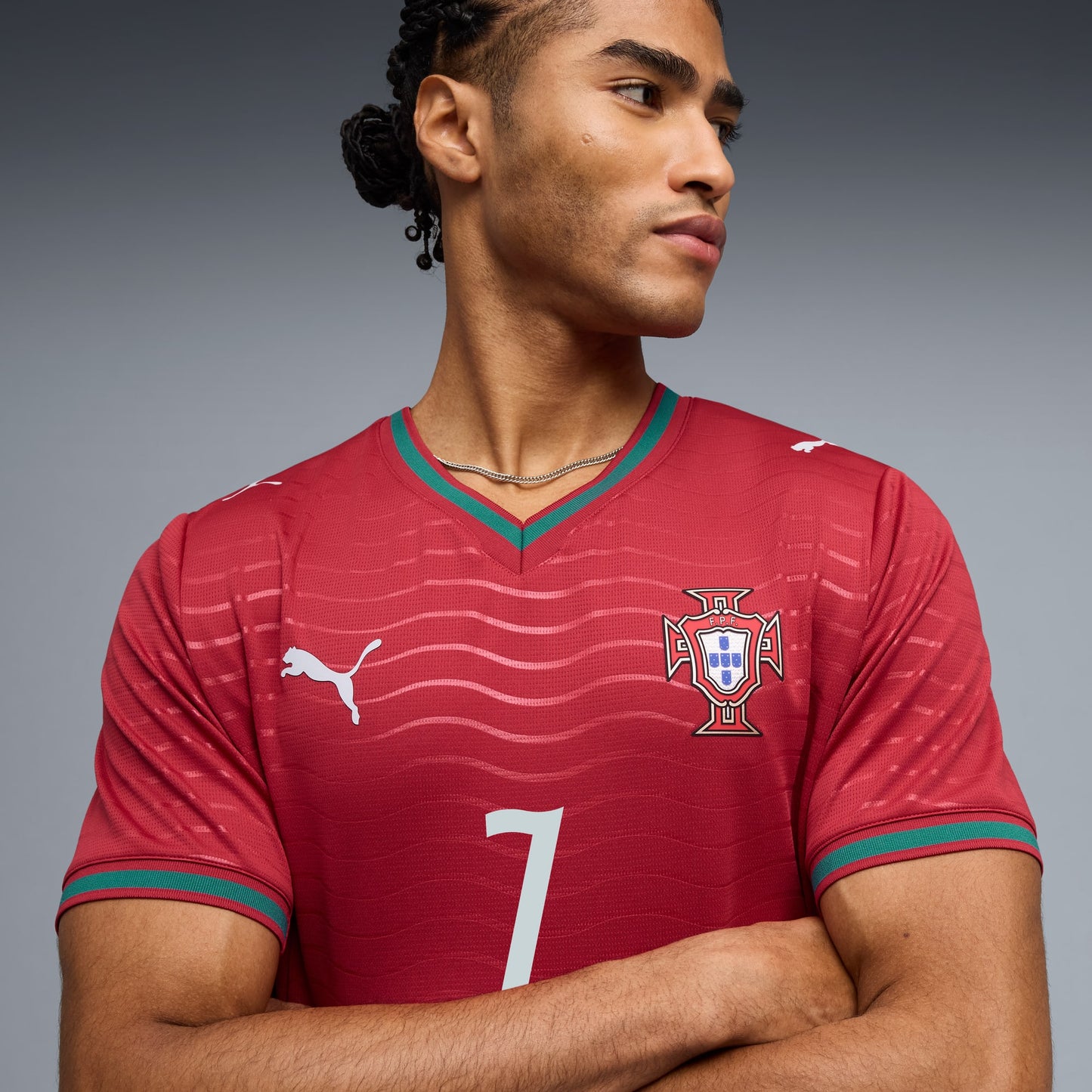 Person wearing a Portugal national team 2026 home stadium jersey with RONALDO #7 custom print