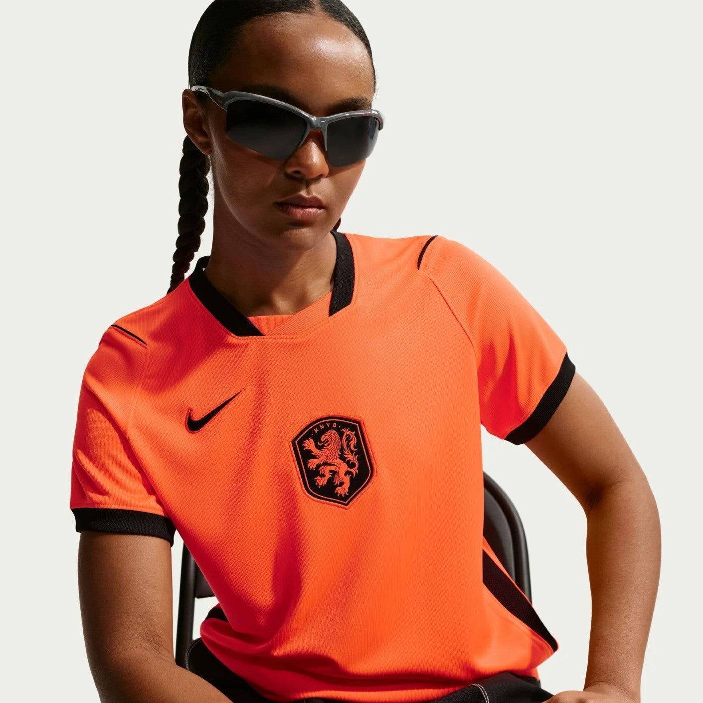 a lady wearing Women's Netherlands 2026 World Cup Home Stadium Replica Jersey